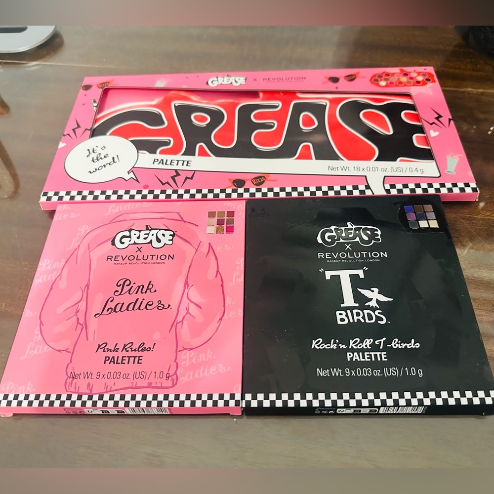NWT: NIB, Revolution London, Grease, Pink Ladies, T Birds, eye shadow palettes.